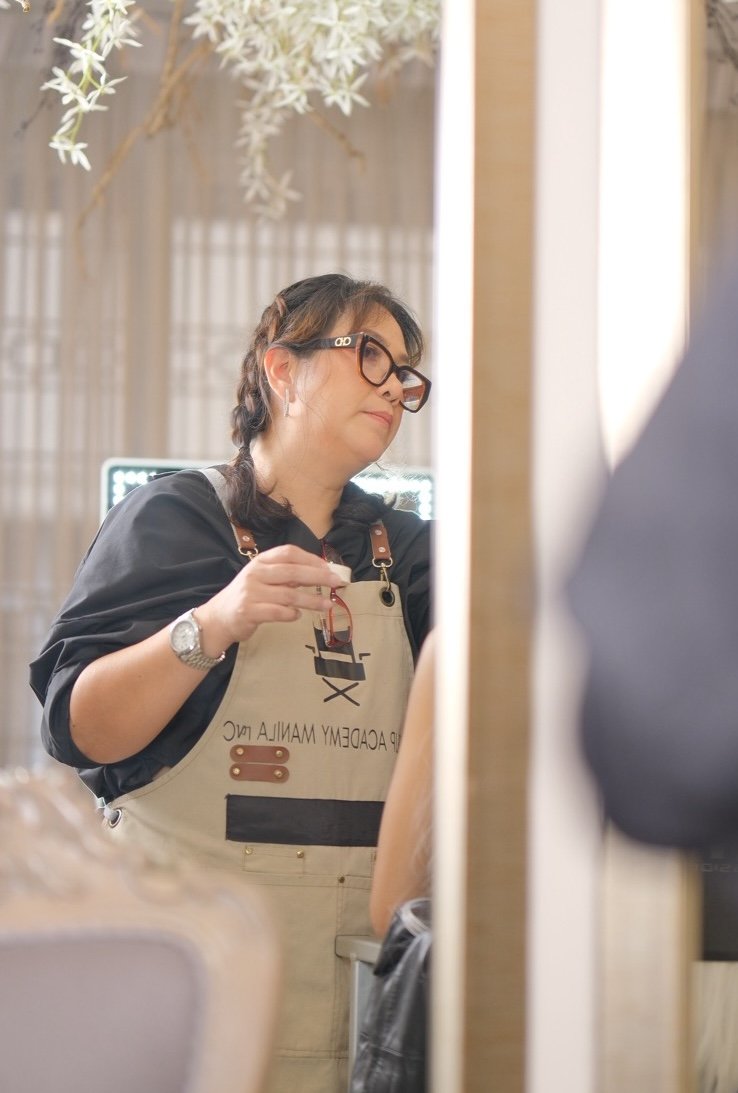 Faye Young working at The Hub, the headquarters of Makeup by Faye Young and Makeup Academy Manila.