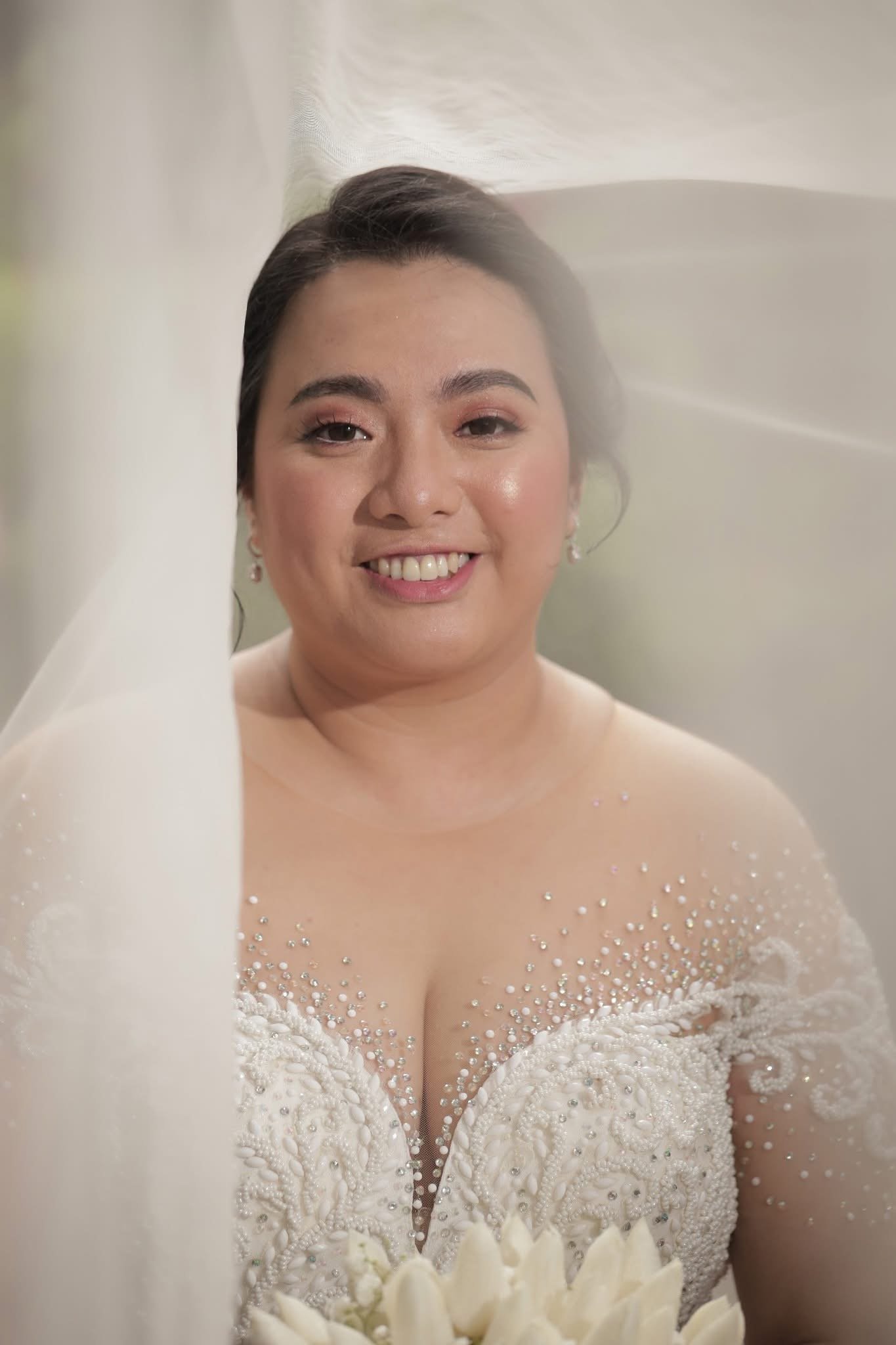 Bride ready for a beach wedding with long-wear, humidity-proof makeup.
