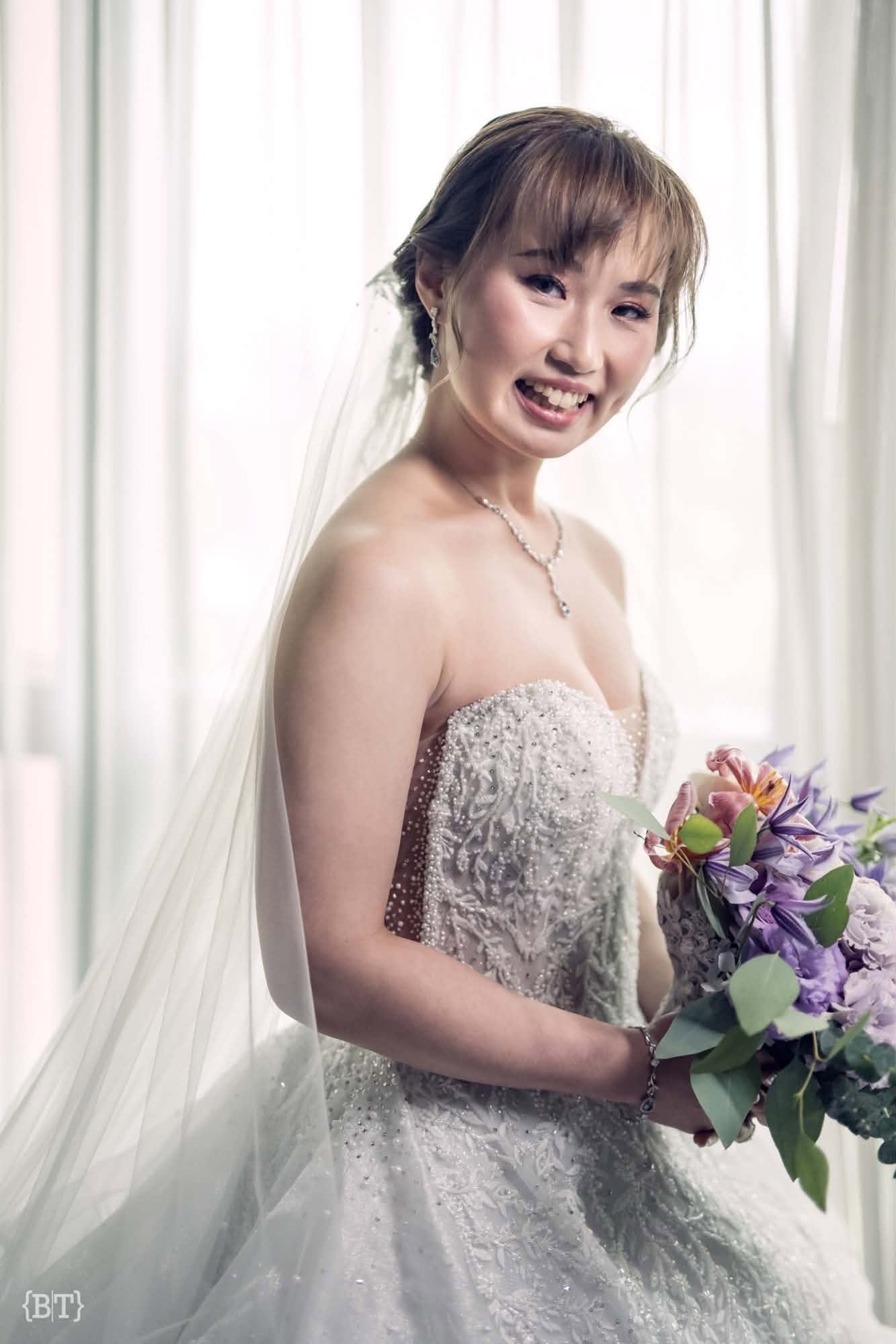 Bridal portrait of Queenie Sy, a longtime client of Faye Young.